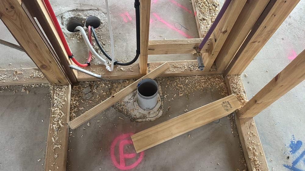 Sewer pipes left open, so building debris can fall in and block them, Beveridge